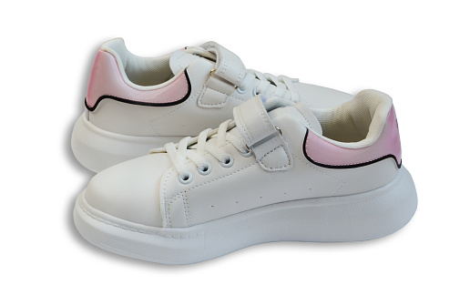 white sports and casual shoes for women or children, teenage leather sneakers, autumn collection