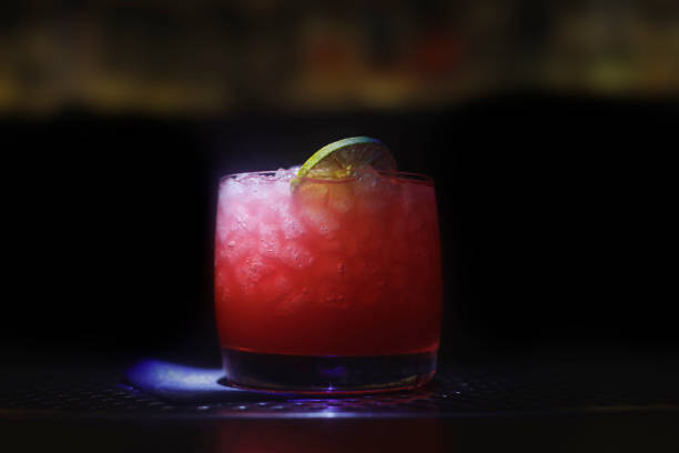 istock A red cocktail with  slice of lemon 1414108078