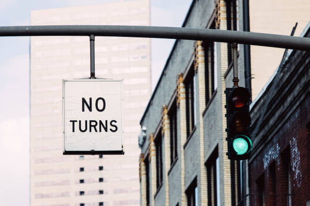 istock No turns traffic sign and green traffic light, 1414110435