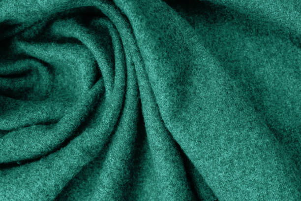 istock Green woolen cozy scarf texture 1414110450