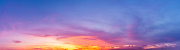 istock The panoramic image shows the natural phenomenon of the sky with multicolored clouds at twilight. 1414111451