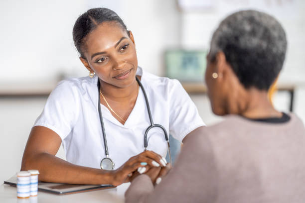 istock Nurse Talking with a Senior About Medications 1414113062