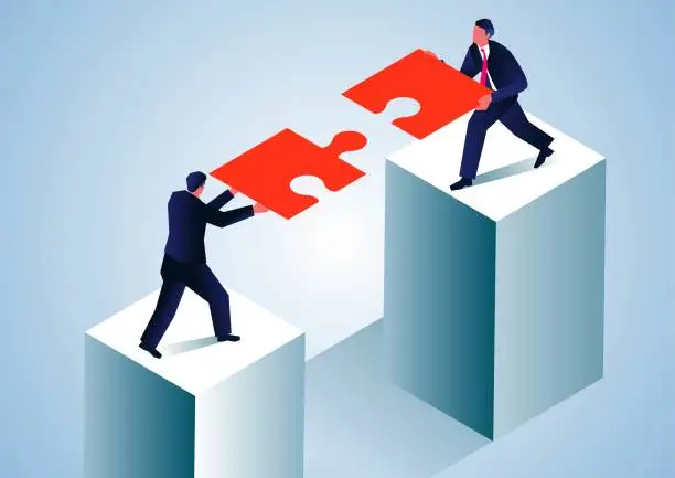 Vector illustration of Isometric two businessmen standing on top of tall cubes together making puzzle pieces and connecting roads, businessmen working together to overcome difficulties, corporate culture concept