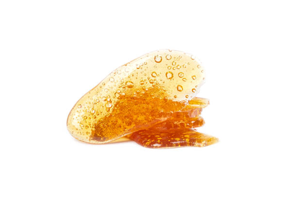 istock yellow cannabis wax resin isolated on white bacground 1414126839