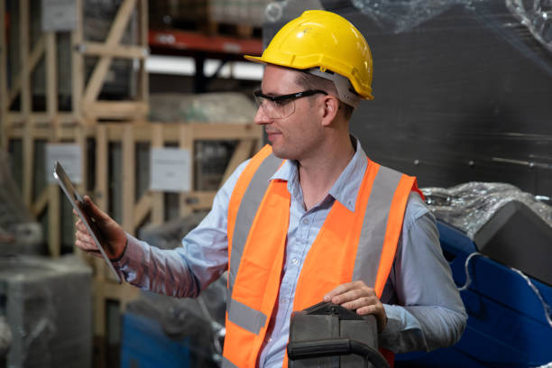 istock Engineer hold tablet to check spare parts inventory list 1414127310