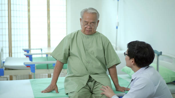 istock Doctor examining patient joint. 1414129851