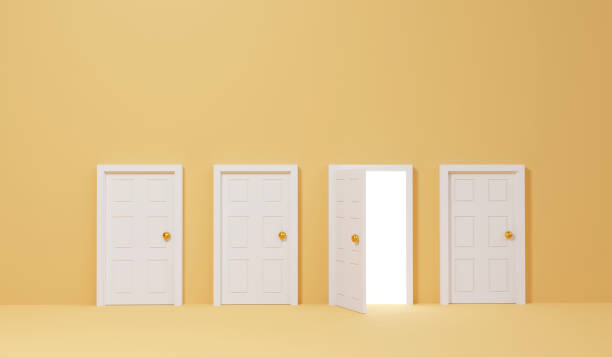 istock Four white doors with the one that opened were lit by a white light. 1414136214