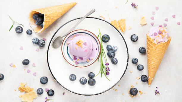 istock Organic blueberry ice-cream on neutral background. 1414138403