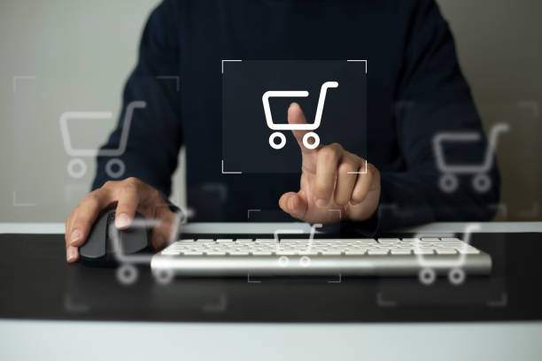 istock shopper using computer and touch virtual screen online shopping. And online payment option or digital wallet online transaction concept. 1414141852