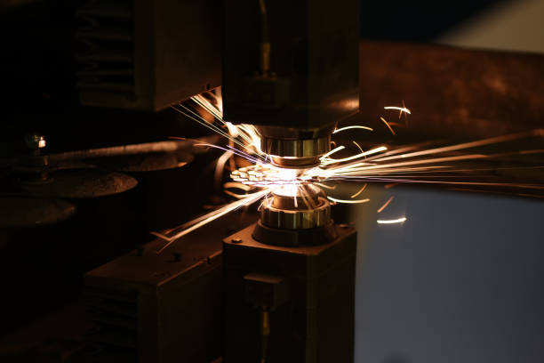 istock Metal cutting process and neon sparks flying out 1414142761