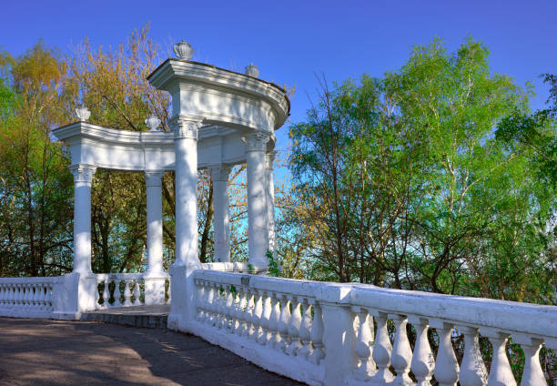 Rotunda on the Moscow embankment. Classic portico gazebo with white balustrade. Cheboksary, Russia, 2022