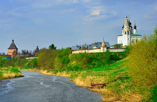 Kamenka River Valley in Suzdal. Old churches and monasteries on the high bank, monuments of Russian architecture of the XVII century. Russia, 2022