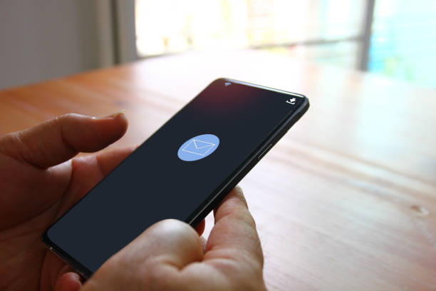 istock Workers use mobile phones to receive email messages , technology concept 1414143538