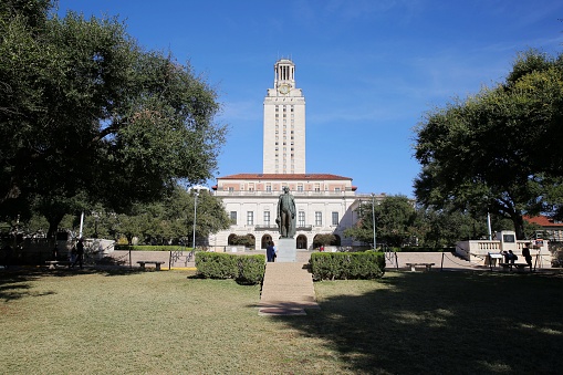 UT Tower on the campus of University of Texas Austin in a sunny morning in fall, Austin, TX, USA