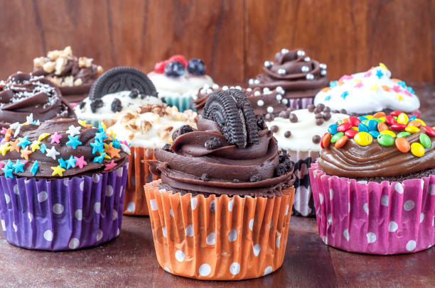 istock Colorful chocolate cupcakes with toppings 1414148974
