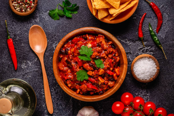 istock Chili Con Carne in bowl on dark background. 1414154672