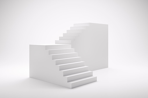 Closeup view of small cubes with stairs pattern isolated over white background