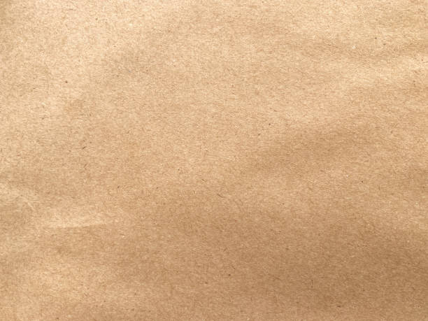 istock Close up crumpled brown paper texture and background with copy space 1414159610