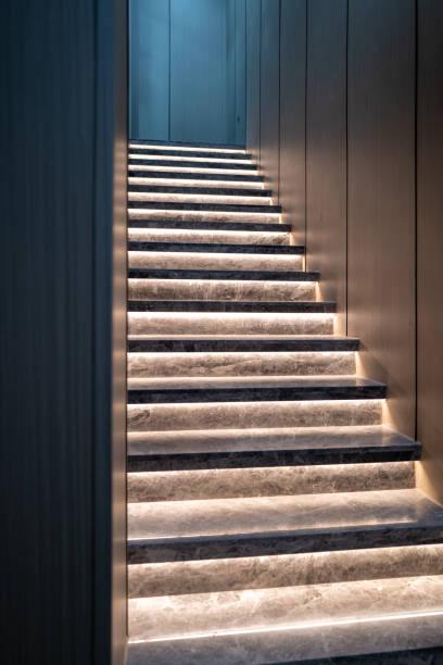 istock Stairs with lights in the room 1414160828