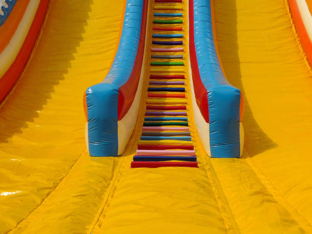 istock colorful inflatable slide for children. Playing 1414161091