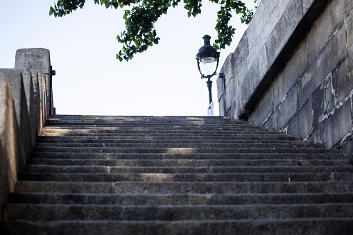 This is a photograph of a stone staircase leading up the hill on a summer day in Washington Park in Macon, Georgia.