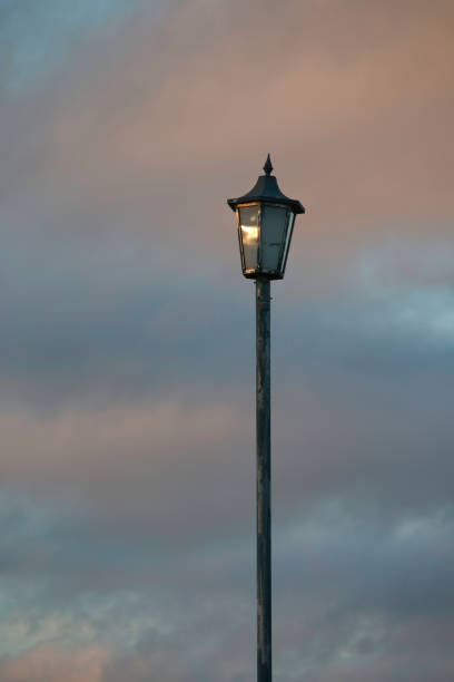 istock Retro street lamp at sunset 1414166143