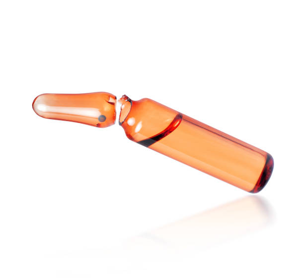 istock Broken ampoules into two parts on a white background 1414166171