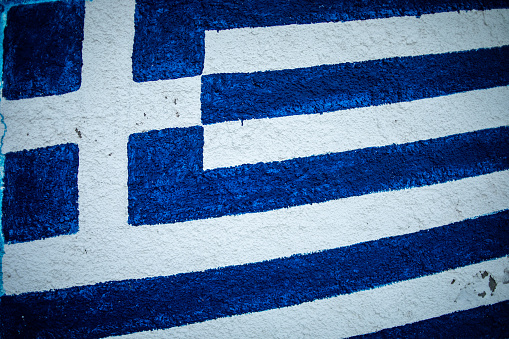 The flag of Greece painted on the wall