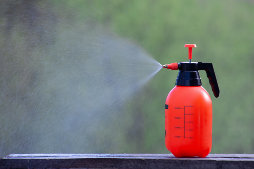 An insect sprayer sprays poison from pests