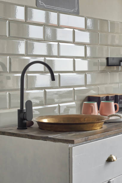 istock Copper sink on elegant kitchen counter at country house. 1414173589