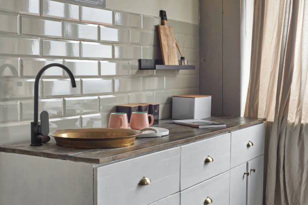 istock Comfortable elegant kitchen counter with sink at country house. 1414173607