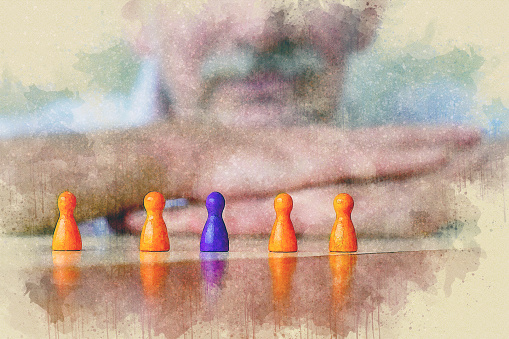 close-up of game pieces on table and businessman in watercolor style