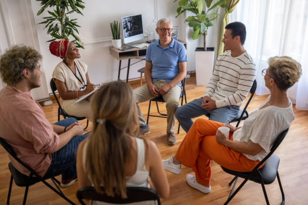 istock Multiracial people at the support group psychotherapy 1414179756
