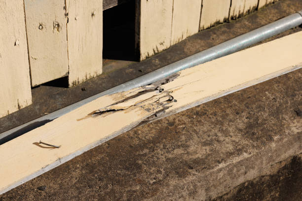 istock Broken paling from a wooden fence 1414182426