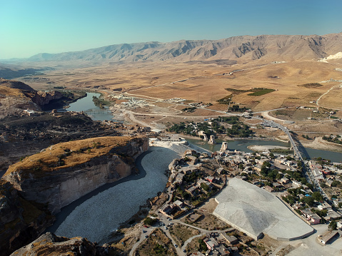 Hasankeyf was an ancient town in Turkey province Batman, which is no longer. The site was flooded by the nearby dam project despite the objections. This photo shows the area that is filled with caves with high architectural value and is located above the actual Hasankeyf site. Drone photo