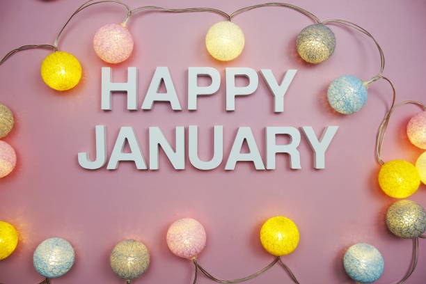 Happy January alphabet letters on pink background