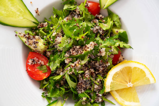 Fresh green mix salad with kinoa, healthy food