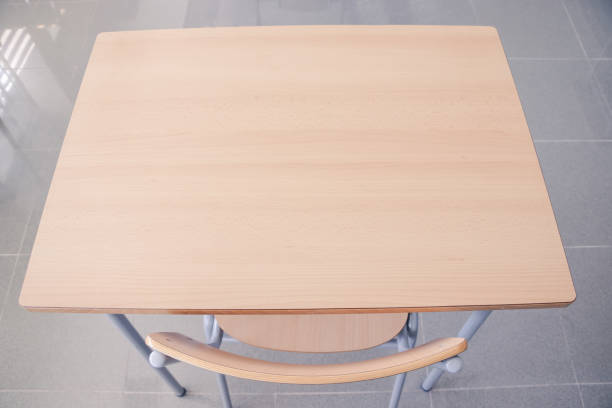 school table and chair seen from above stock photo
