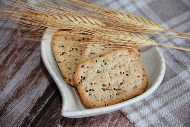 istock crispy diet square cookies with black cumin seeds and quinoa 1414206227