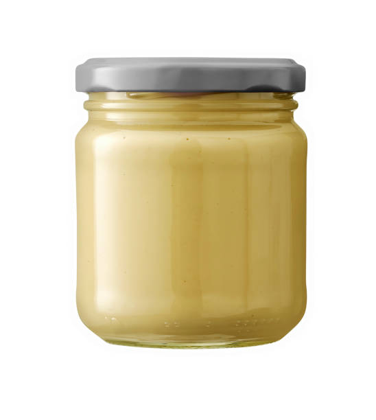 Mayonnaise in glass jar isolated on white background. stock photo