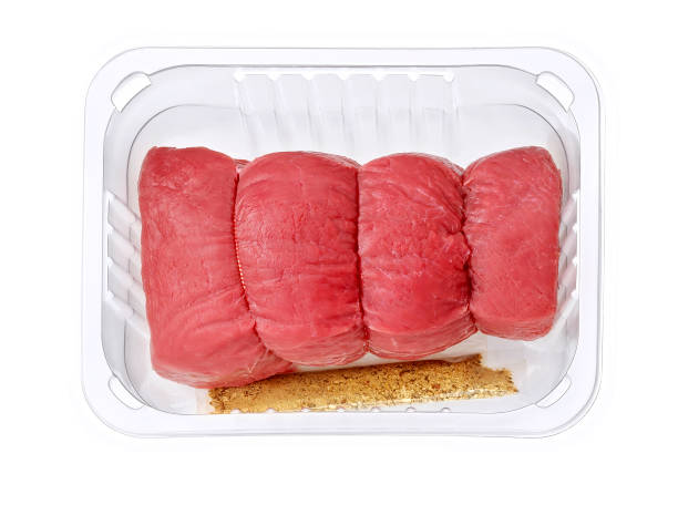 istock beef roulade with herbs in plastic tray isolated on white 1414218509