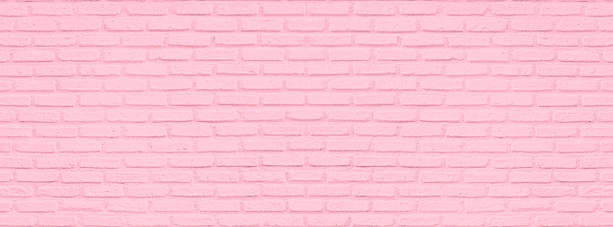 Clean background shot of a simple pink brick wall full frame vertical background 