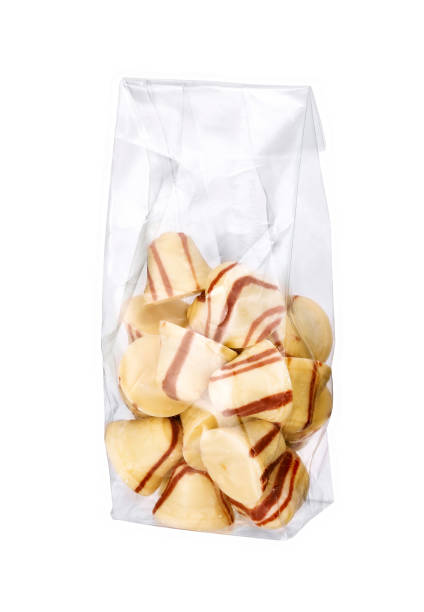 luxury Chocolate bon bon in plastic bag isolated on white.