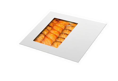 smoked salmon in a plastic tray isolated on white.