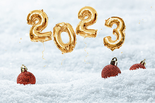 Silver numbers 2025 new year balloons among confetti in sunlight on pink turquoise background Happy new year celebration party. Greetings and congratulation
