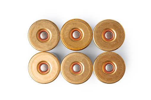 Shotgun shell cartridge isolated on white background close up