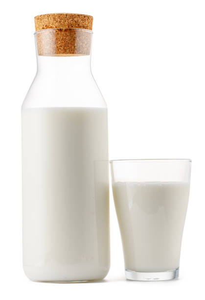 istock Closed glass milk bottle isolated on white background 1414226729
