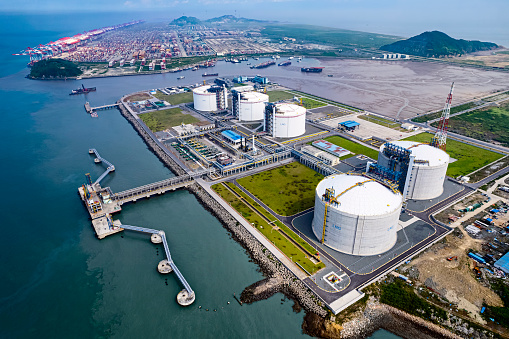 Picture of large LNG (Liquefied natural gas) tanks at LNG regasification terminal in Yangshan deepwater port, Shanghai, China