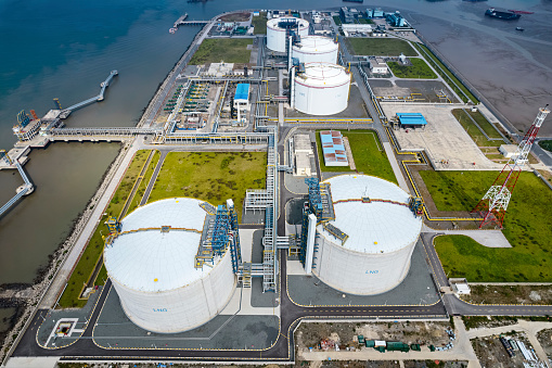 Picture of large LNG (Liquefied natural gas) storage tanks at LNG regasification terminal