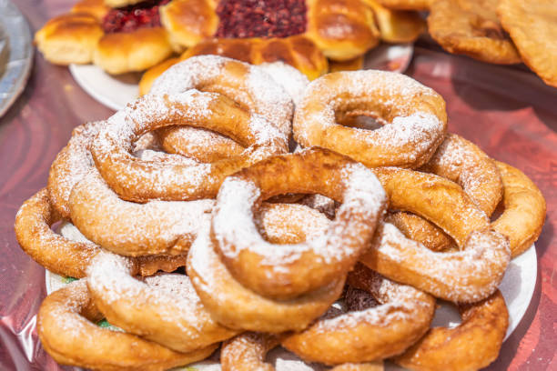 istock round sweet bagels on plate on the table 1414236328